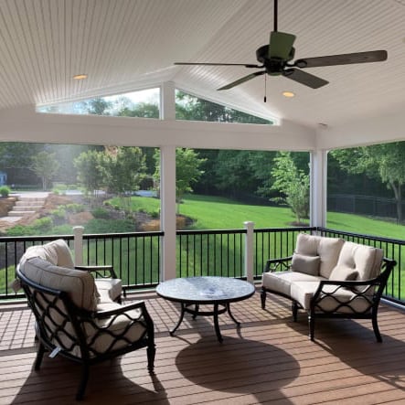 A screened in porch on a sunny day
