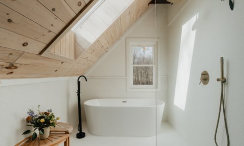 Elegant bathroom with a modern freestanding bathtub